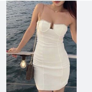 Zara white strapless mini dresss with rhinestones.
Makes the perfect NYE dress!